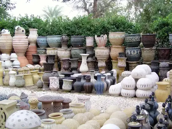 Pottery and lanterns stocked in our yard